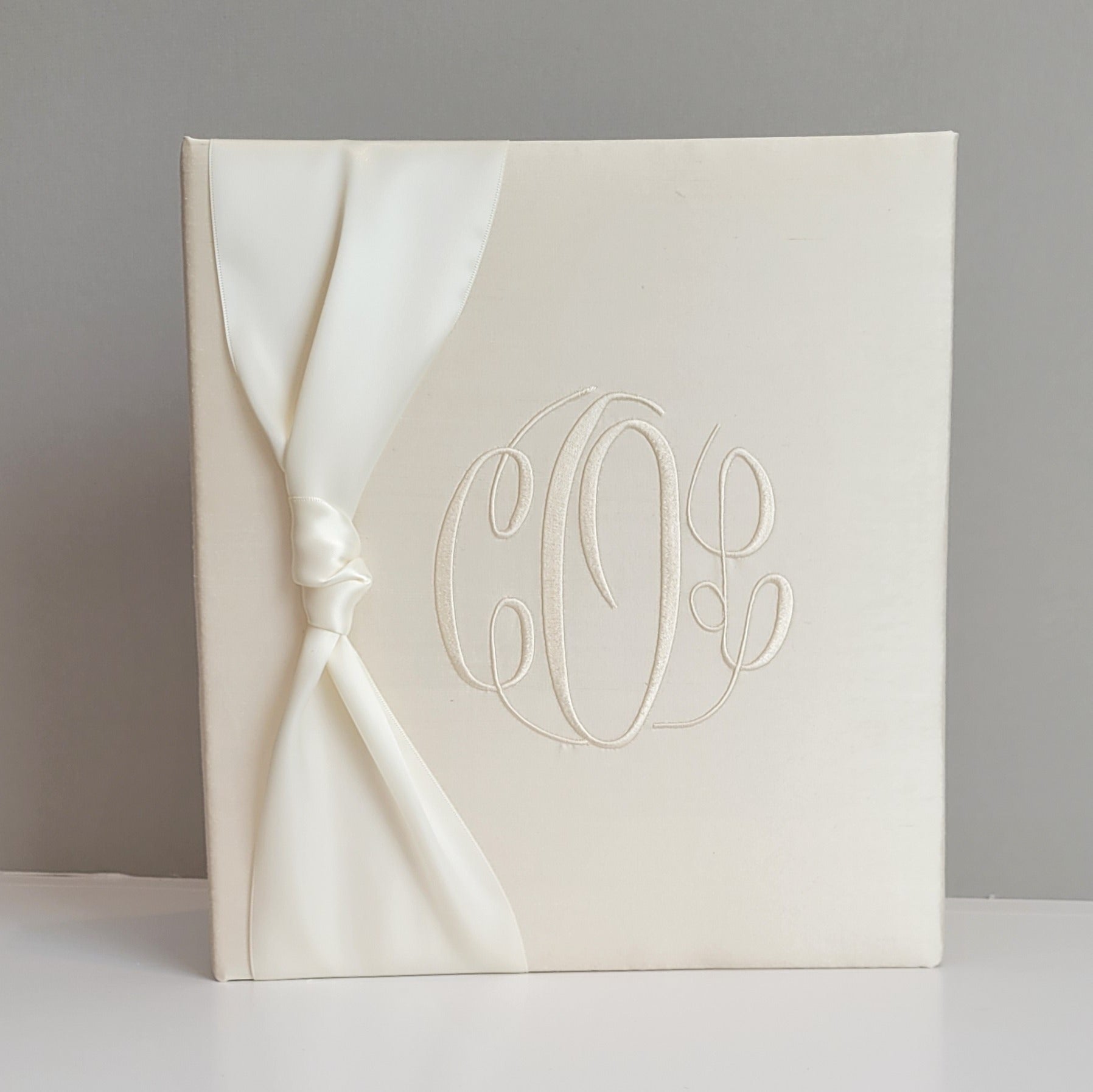 Ecru silk handmade baby memory book with satin bow by AP Creations