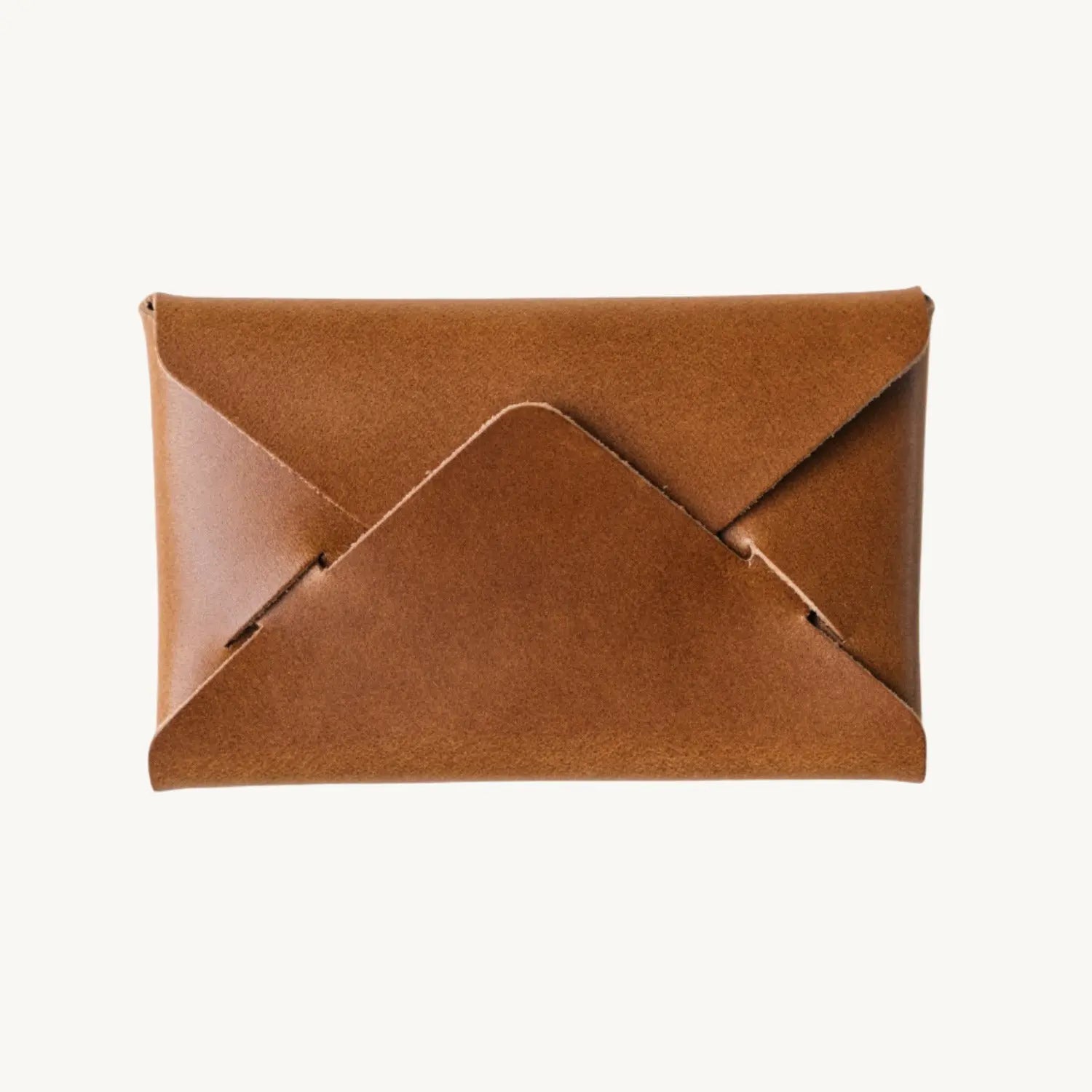 Brown leather envelope wallet on a white background. Minimalist design.