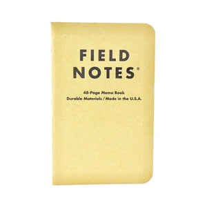 Field Notes brand notebook with kraft paper cover and black text
