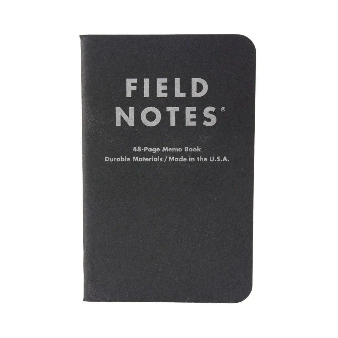 Black Field Notes pocket size memo notebook with text on cover