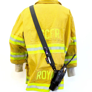 Yellow firefighter jacket with radio strap and accessories