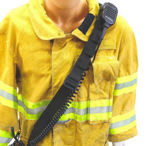 Firefighter radio strap with Motorola speaker mic on yellow jacket