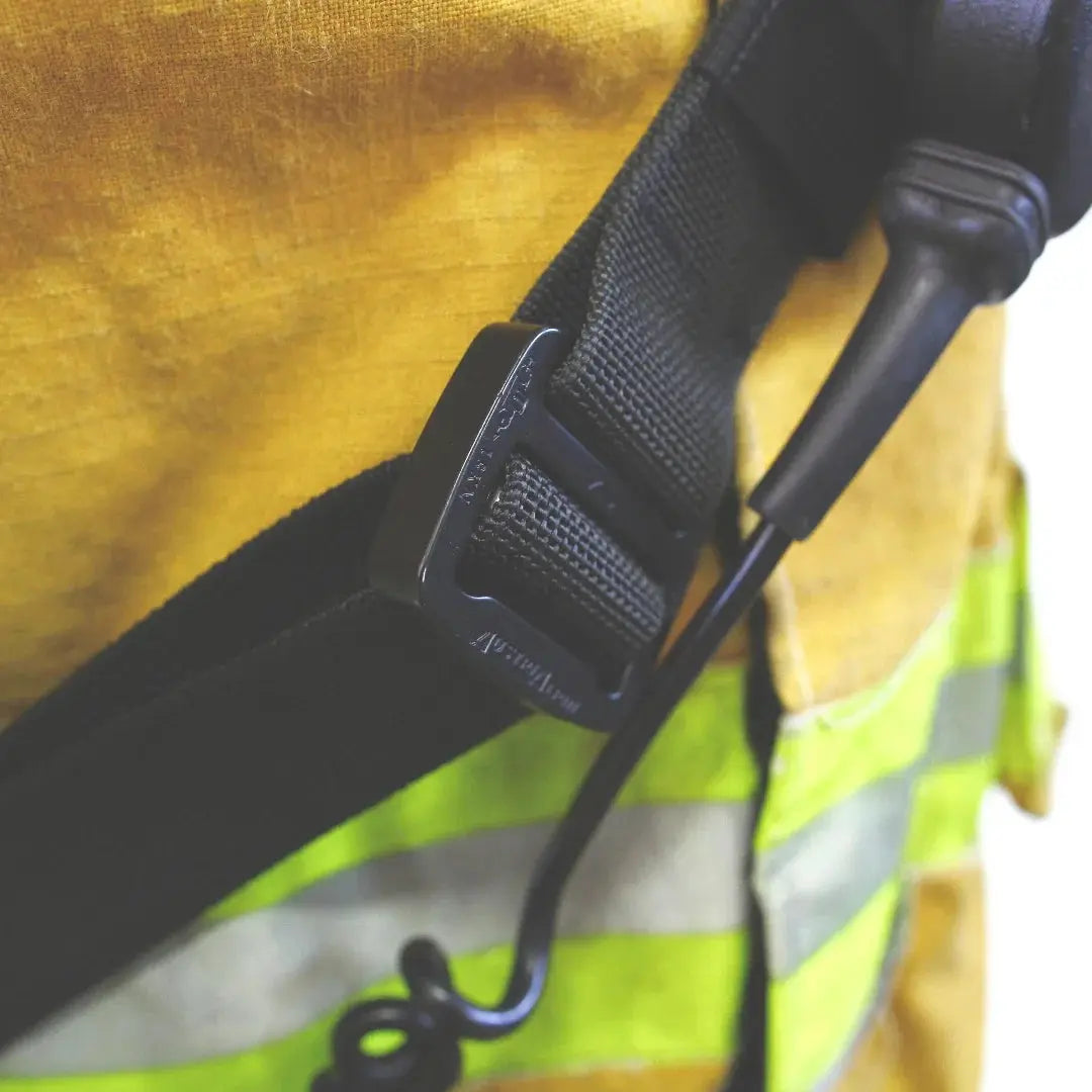 Firefighter radio strap with black nylon webbing and metal buckle