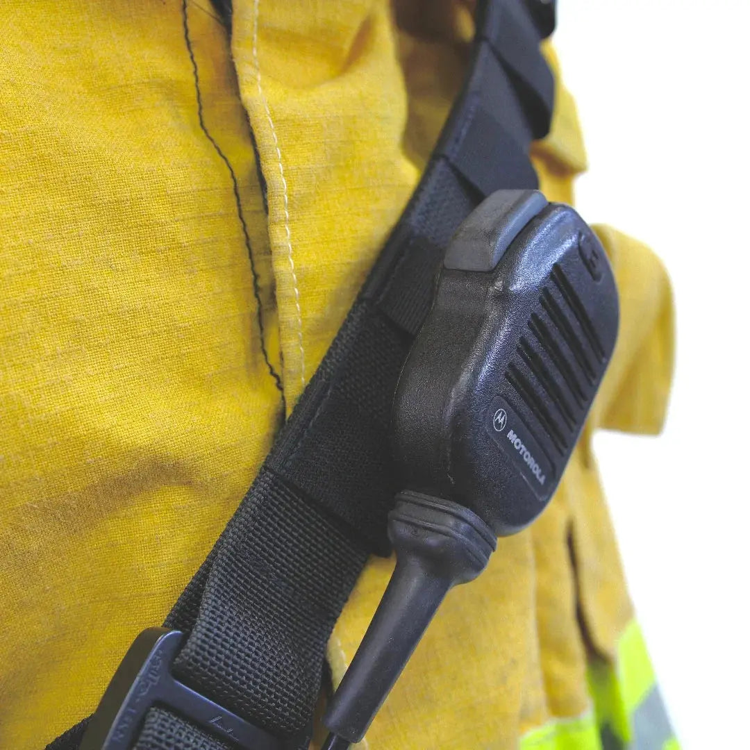 Yellow firefighter radio strap with black webbing and Motorola speaker mic.