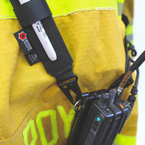 Black nylon firefighter radio strap with pen holder and attached radios