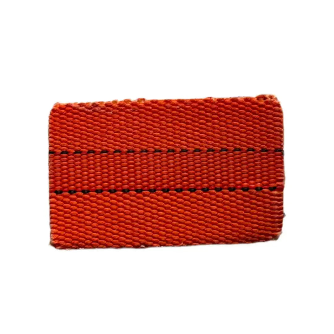 Orange woven firehose patch with black stitching, credit card size