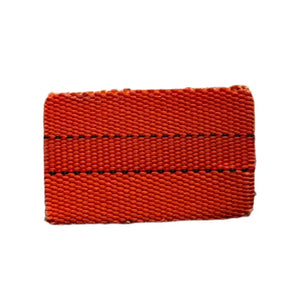 Orange woven firehose patch with black stitching, credit card size
