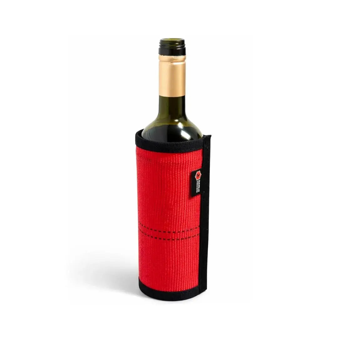 Red wine bottle cover made from firehose material with black trim.