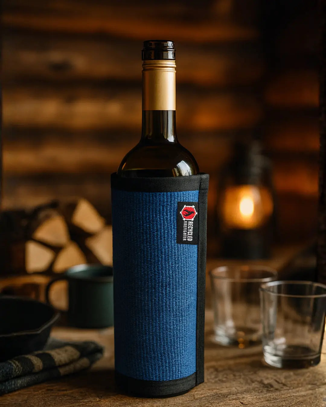 Blue firehose wine bottle cover made from recycled firefighter gear
