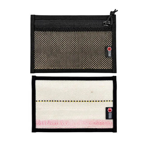 Two flat pouches, one black mesh and one striped fabric, with brand logos.