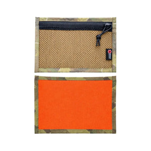 Flat EDC pouch with multicam pattern, mesh front pocket, and orange back panel.