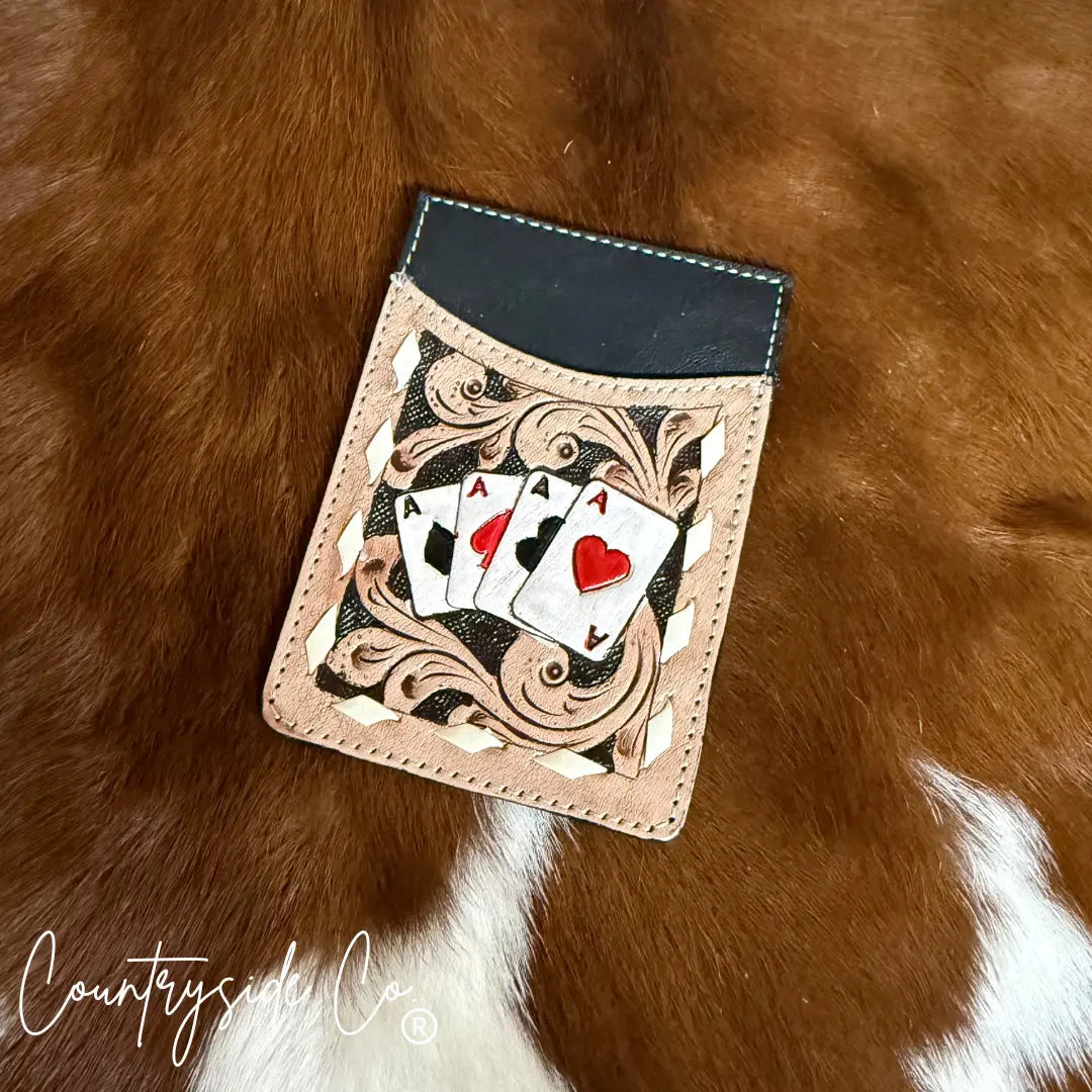 Tooled leather credit card holder with hand-painted playing cards
