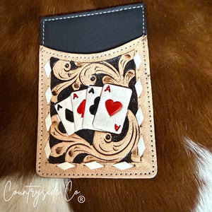 Tooled leather credit card holder with four aces playing cards and black top slot.
