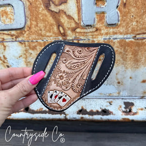 Hand-tooled leather knife sheath with poker ace cards and floral patterns