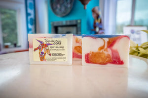 Honeysuckle goat's milk soap slice, 5 oz, with swirled pink and orange colors.