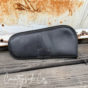 Black leather carry case with Countryside Co. logo.