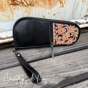 Black leather 12" carry case with floral tooling and wristlet, Main Street Collective.