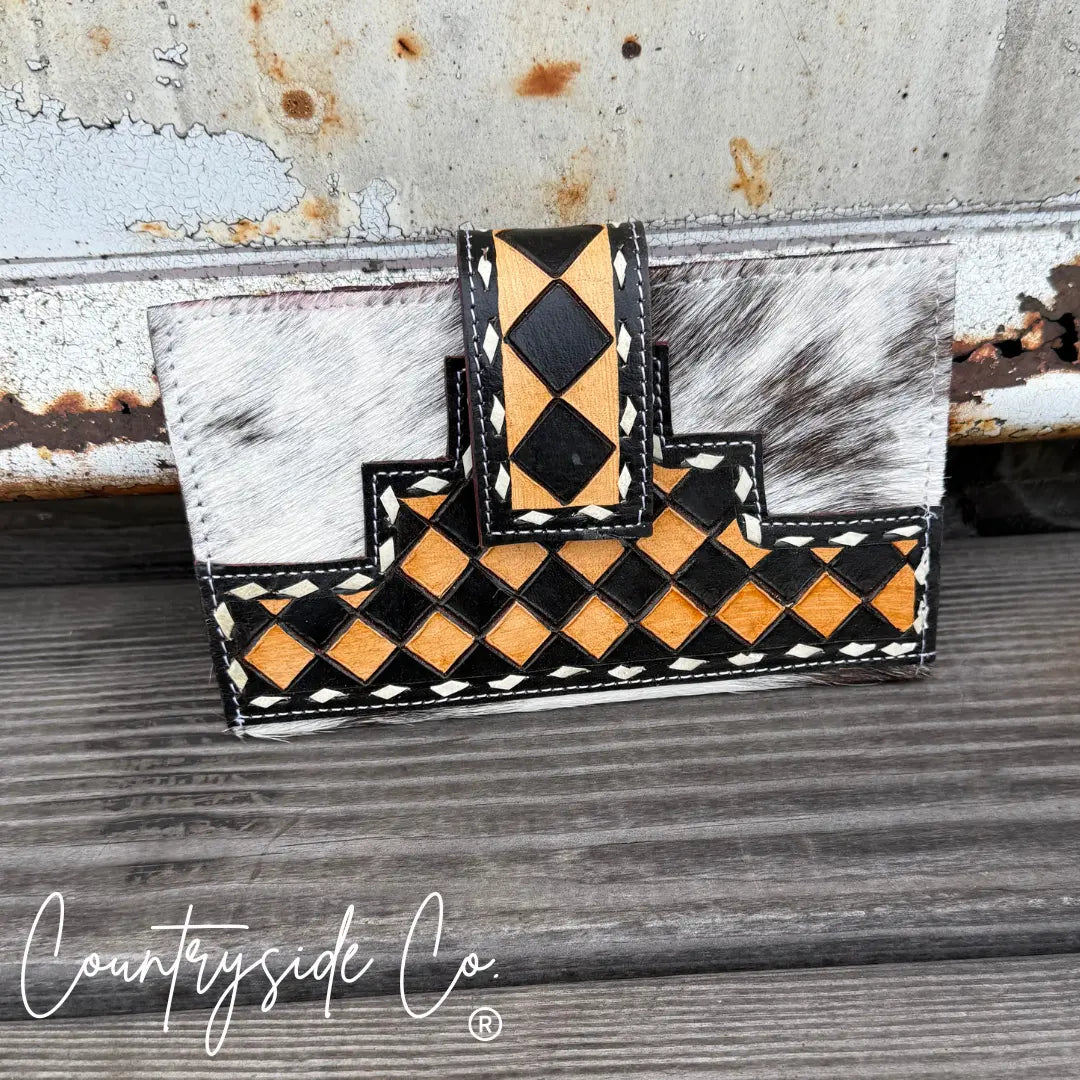 High Plains checkered cowhide wallet with brown and black diamond pattern.
