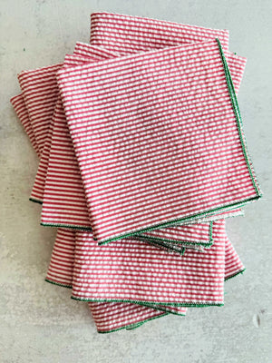 Red and white seersucker napkins with green trim