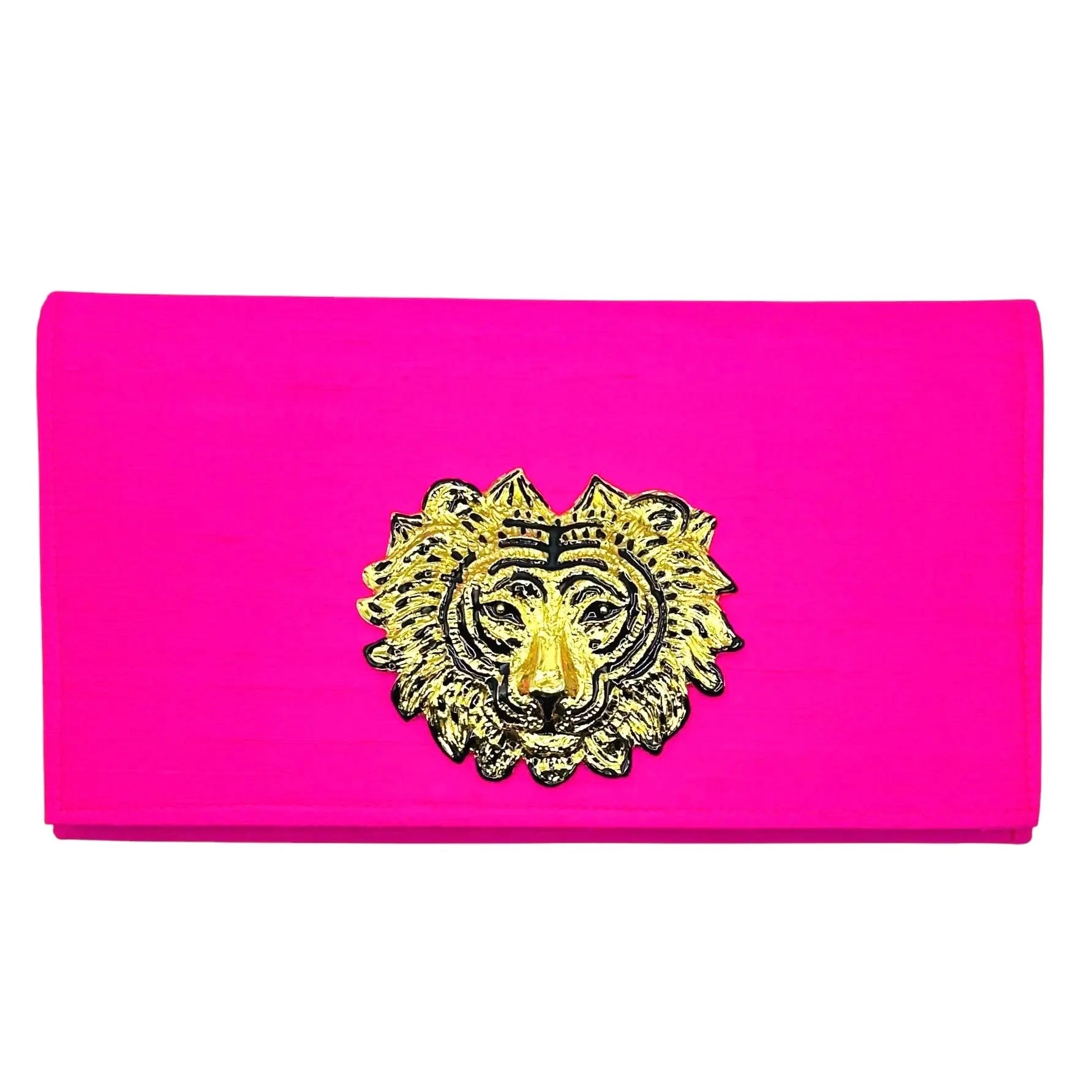 Hot pink clutch with gold lion emblem and magnetic snap closure