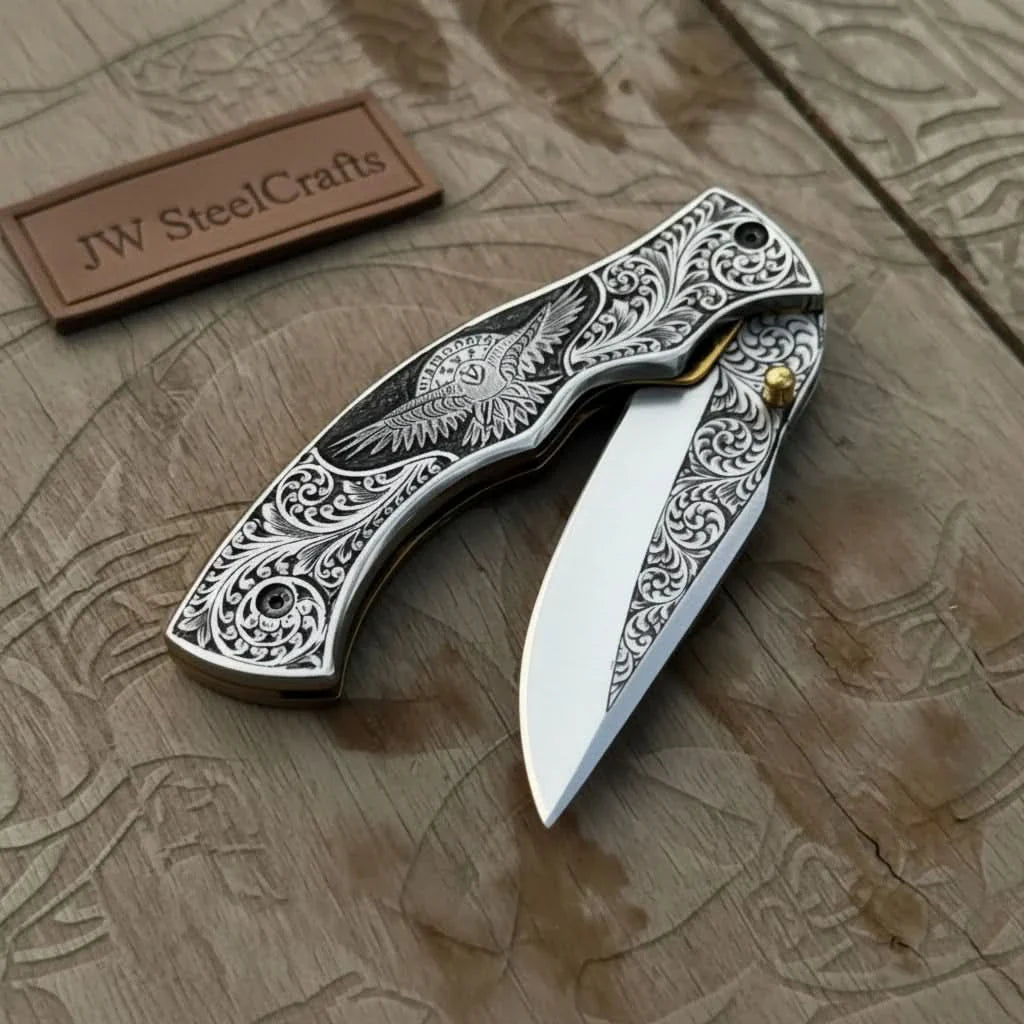 Hand Engraved Folding Knife — Eagle Motif Stainless Steel Scales by JW SteelCrafts, Damascus knife main product photo