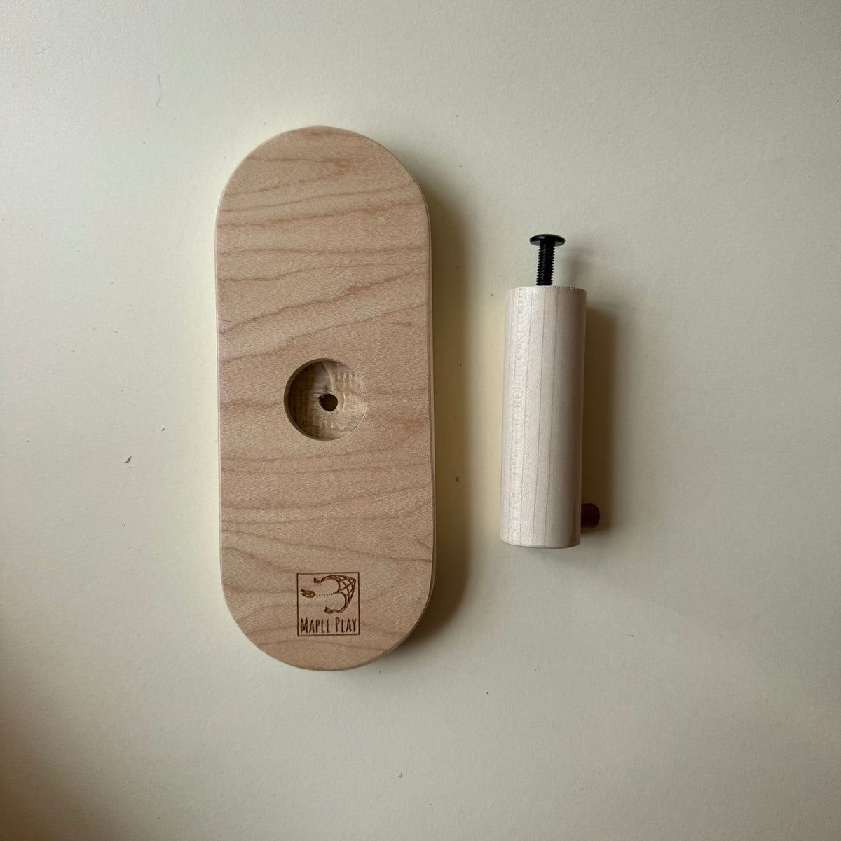 Wooden balance board wall rack with rounded maple peg