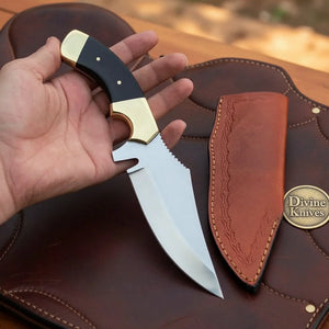 Buffalo Horn Skinner Knife with Brass Bolsters and Tooled Leather Pouch Sheath