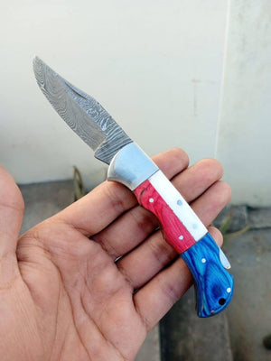 Americana Folding Pocket Knife with Patterned Steel Blade
