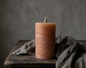 Tangerine textured unscented pillar candle by Believe Candle