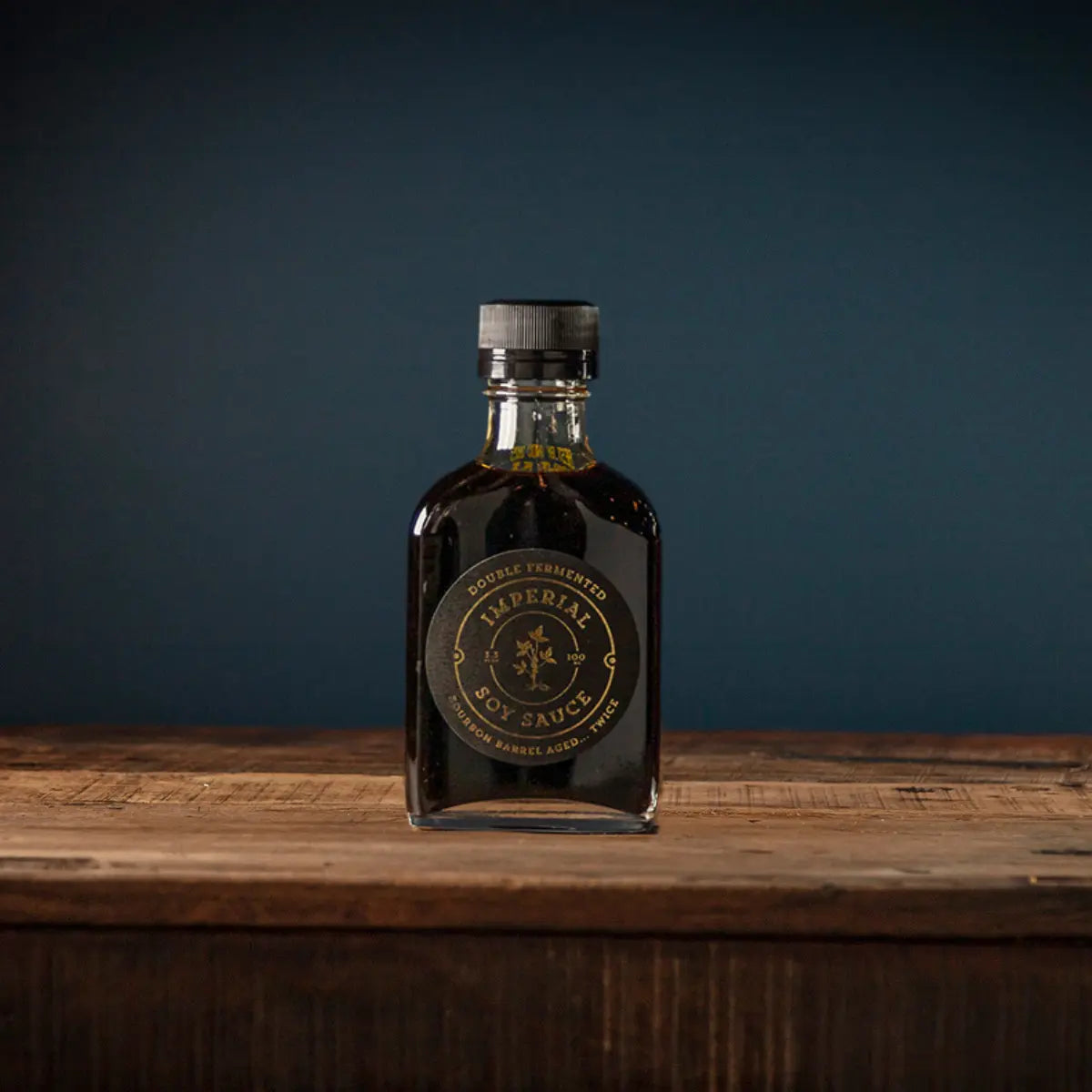 Imperial Double Fermented Soy Sauce bottle on wood for marinades and glazes