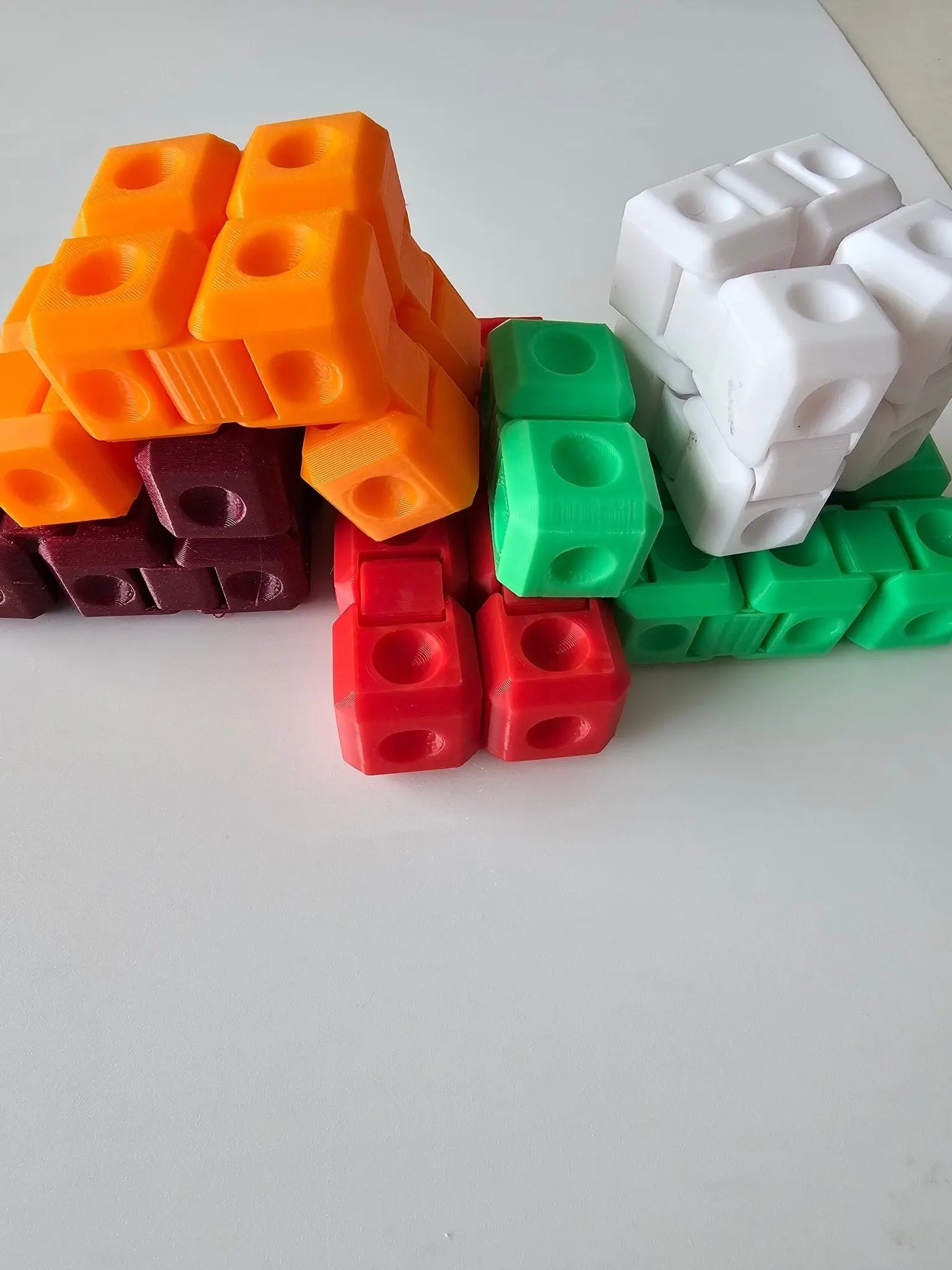 The Tween Space Infinity Fidget Cube wholesale assorted bulk packs in colorful 3D printed sensory cube styles