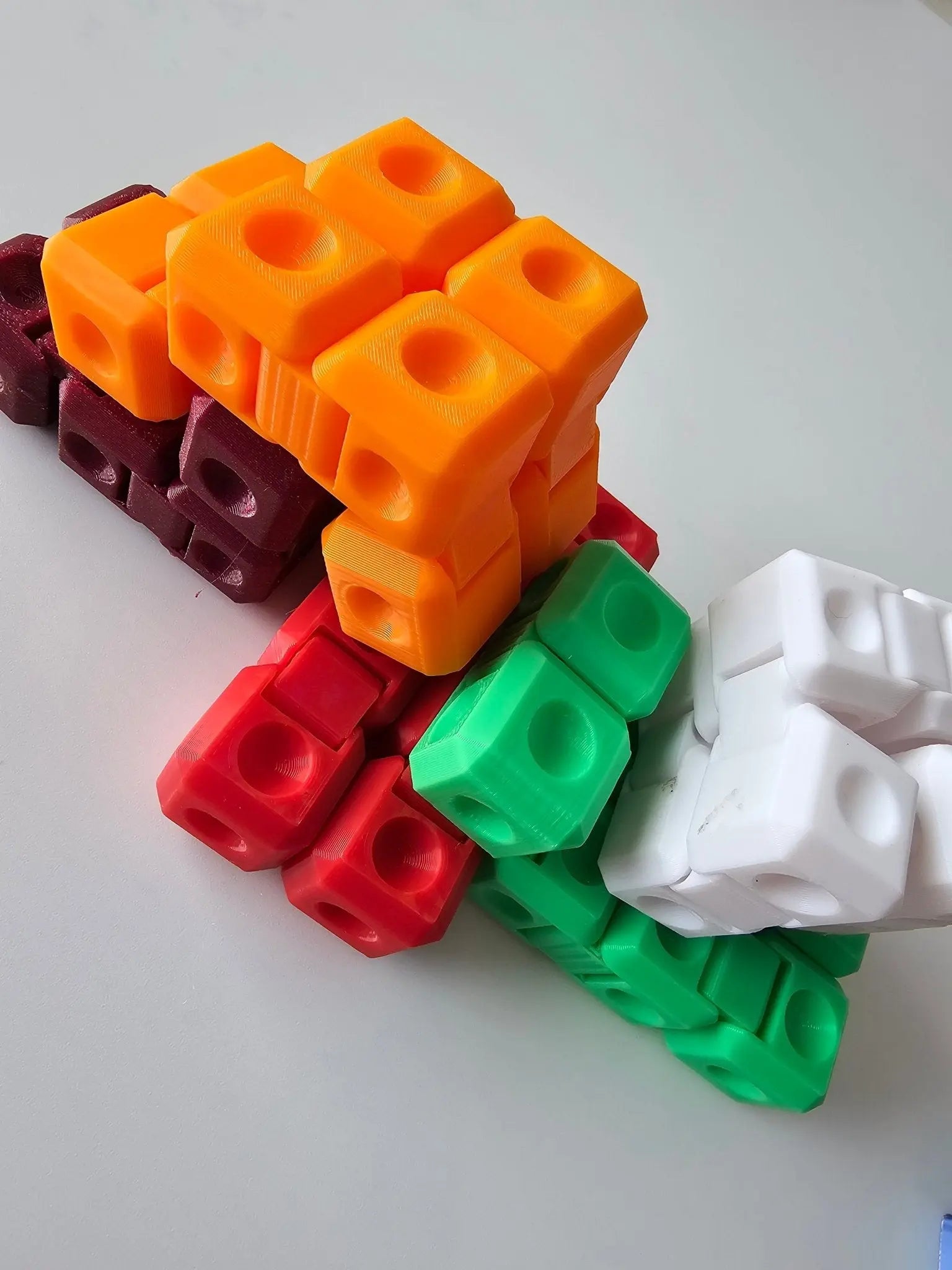 Assorted Infinity Fidget Cubes by The Tween Space for wholesale classroom rewards and sensory toy displays