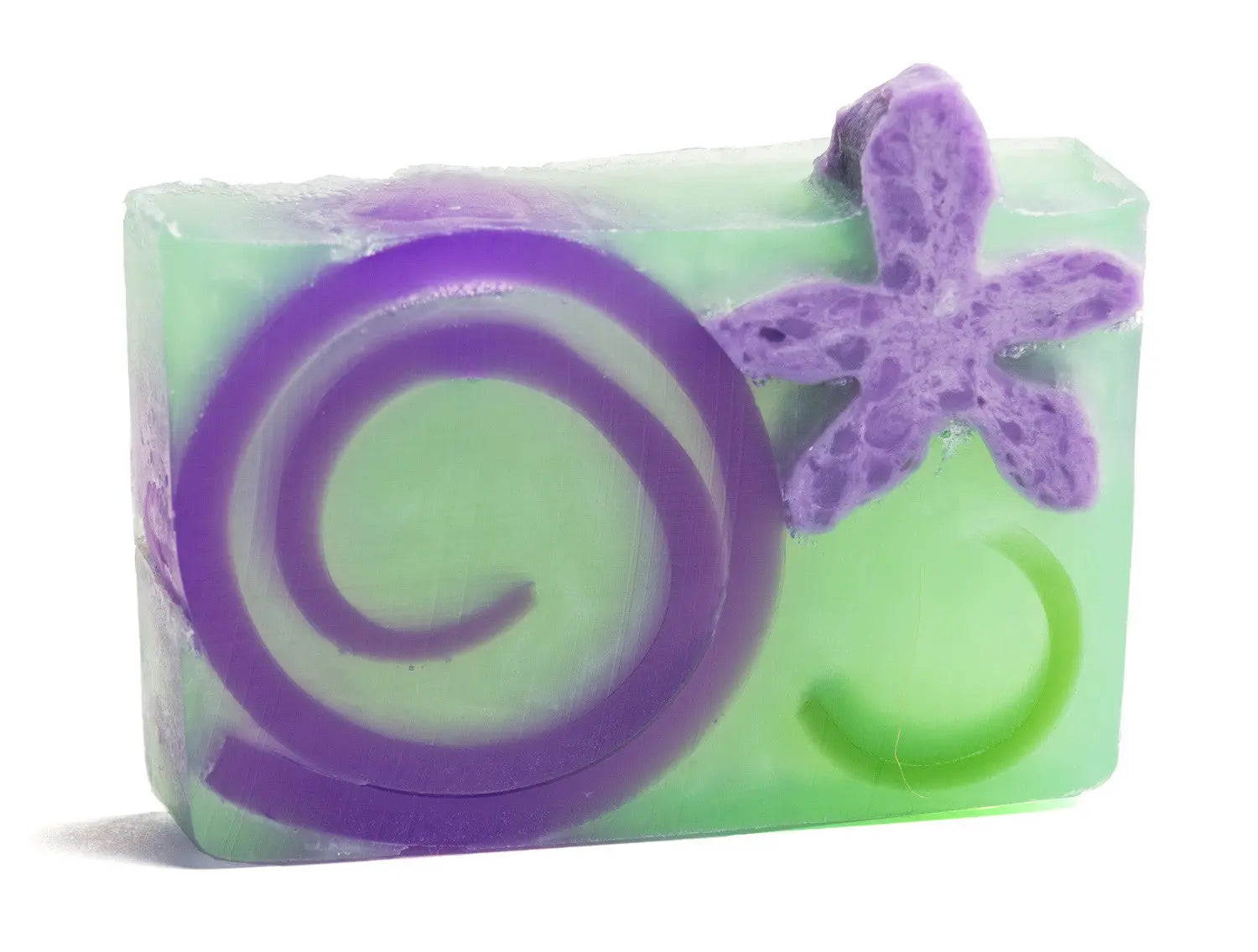 Clear rectangular soap with green and purple swirls and a purple flower embellishment