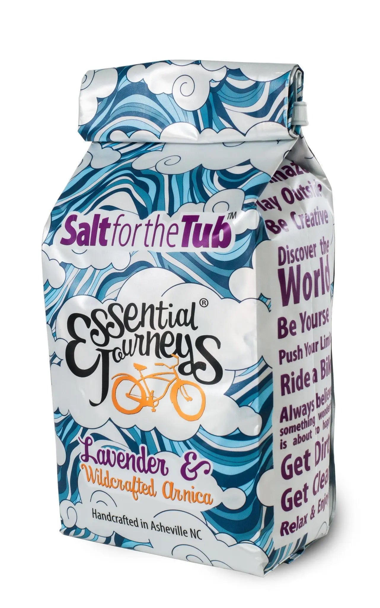 Essential Journeys lavender and arnica bath salts bag with cloud and wave design.