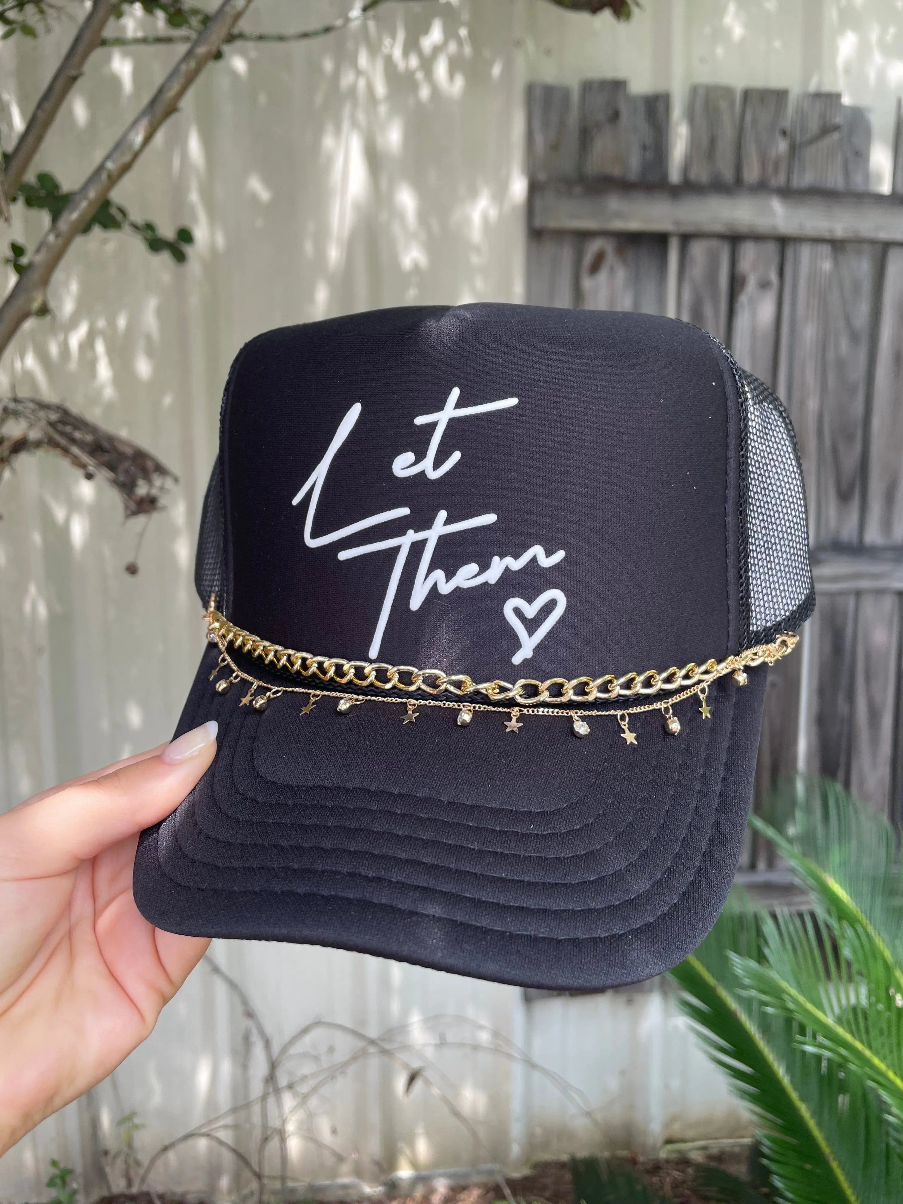 Let Them Black Trucker Hat by Southern Bliss Company, Southern lifestyle apparel main product photo