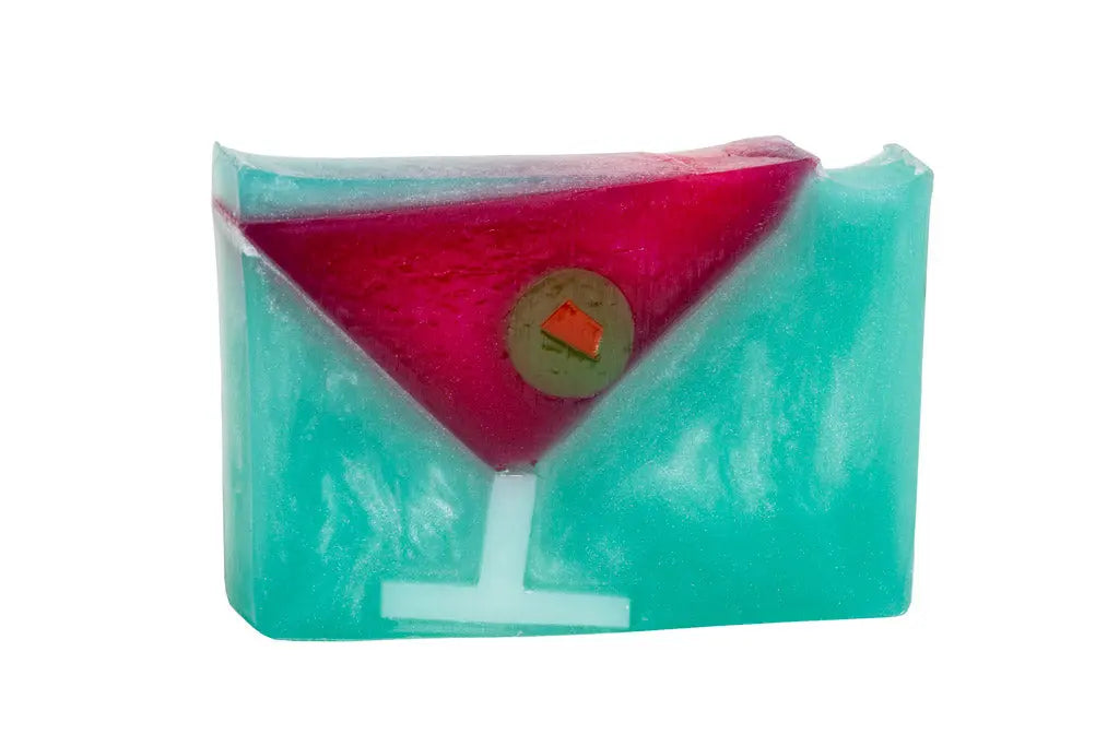 Martini glass shaped soap with teal and pink colors and an olive slice detail.