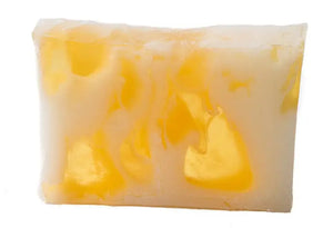 Rectangular milk and honey soap slice with white and yellow swirls