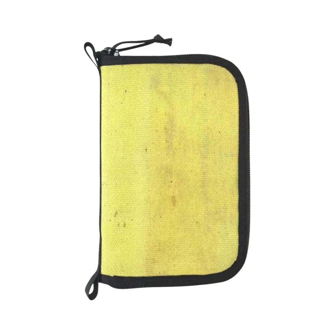 Yellow zippered toiletry bag with black trim and drawstrings