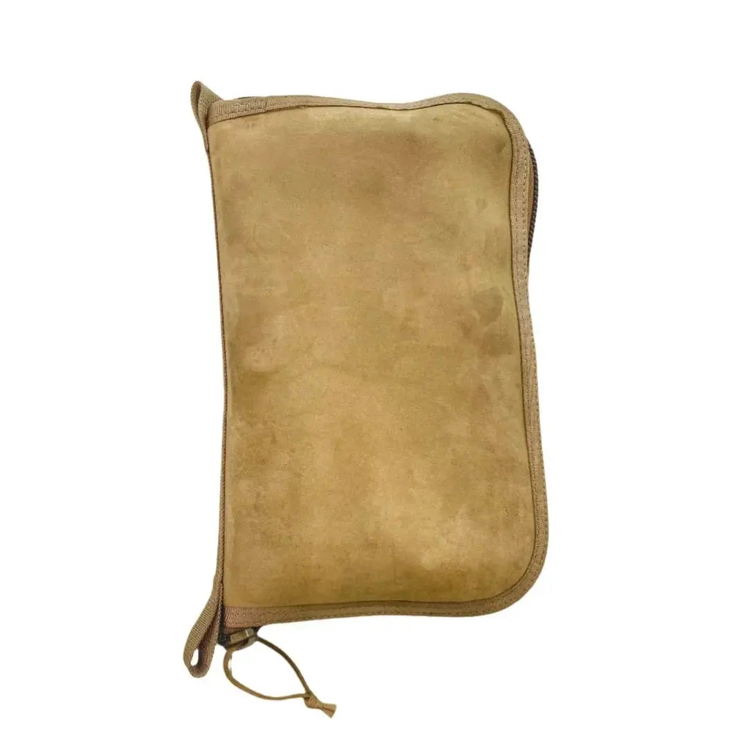 Brown leather dopp bag with zipper closure and drawstring detail.