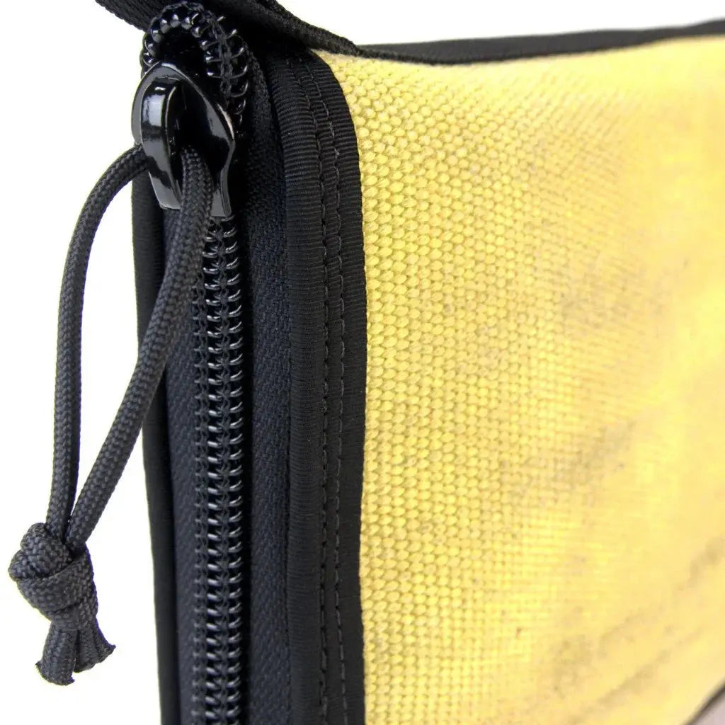 Major Dopp Bag with yellow canvas and black zipper detail.