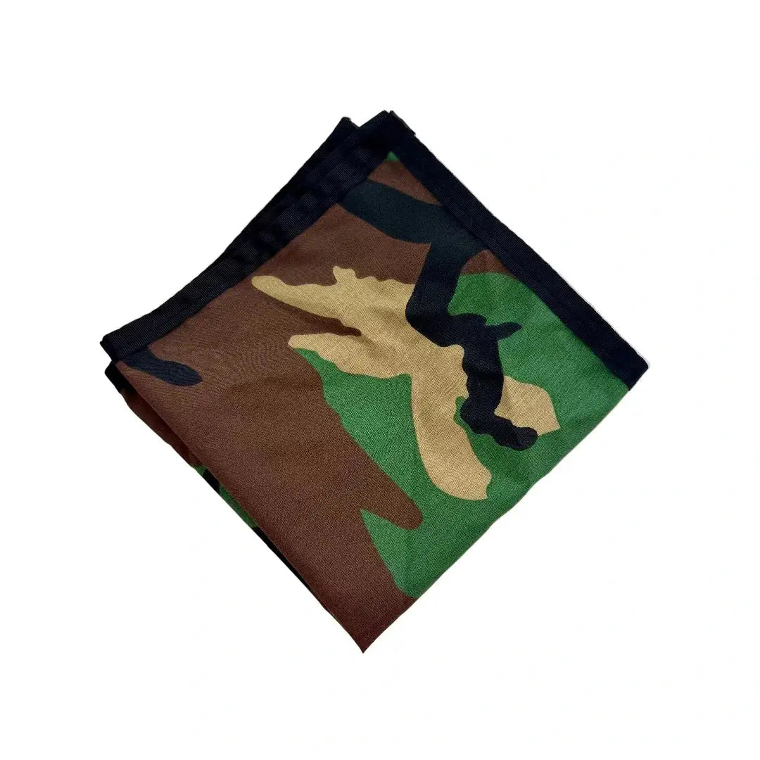 Folded camouflage bandana with black binding.