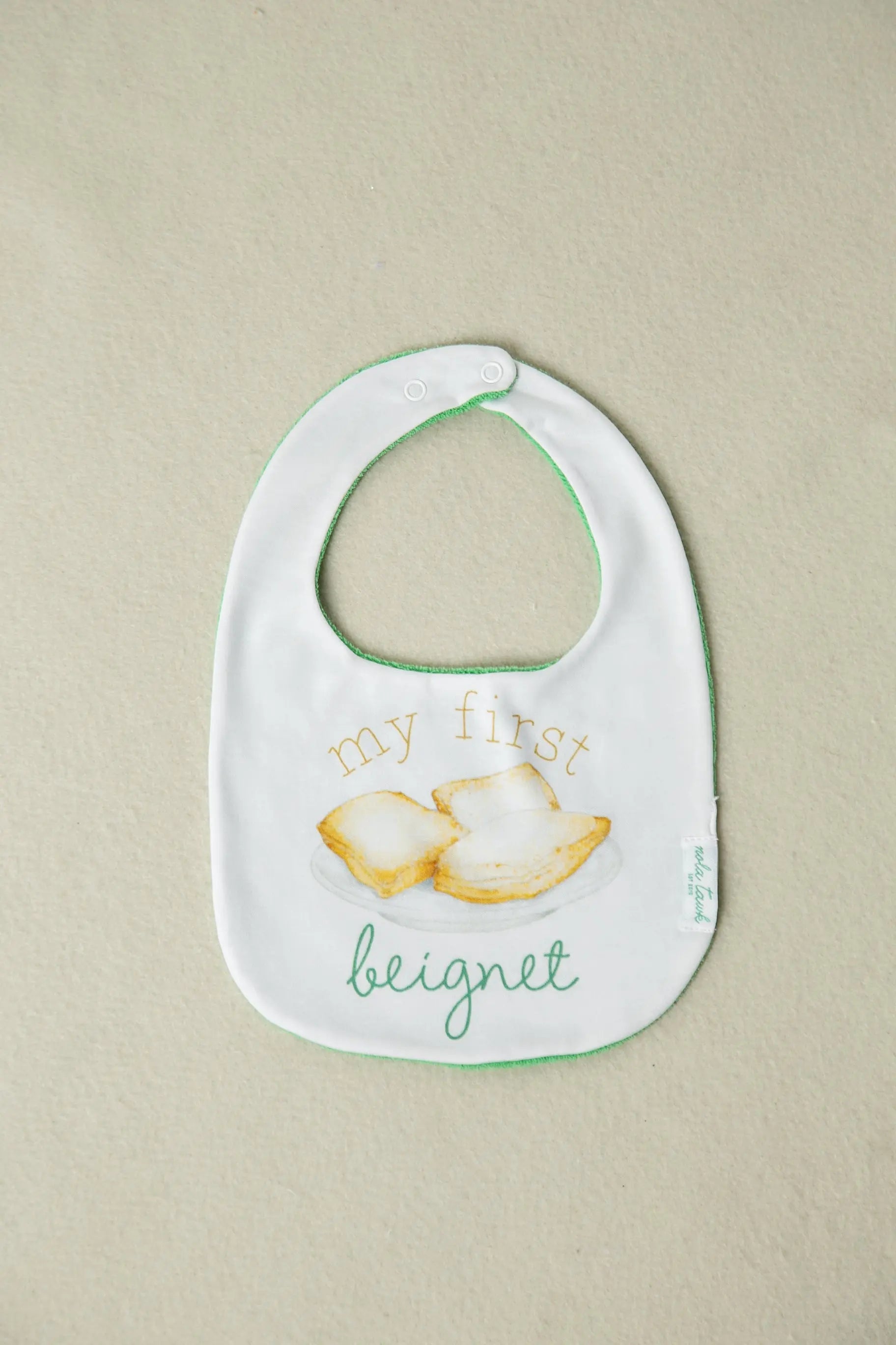 My First Beignet Organic Cotton Baby Bib by Nola Tawk, children's boutique clothing main product photo