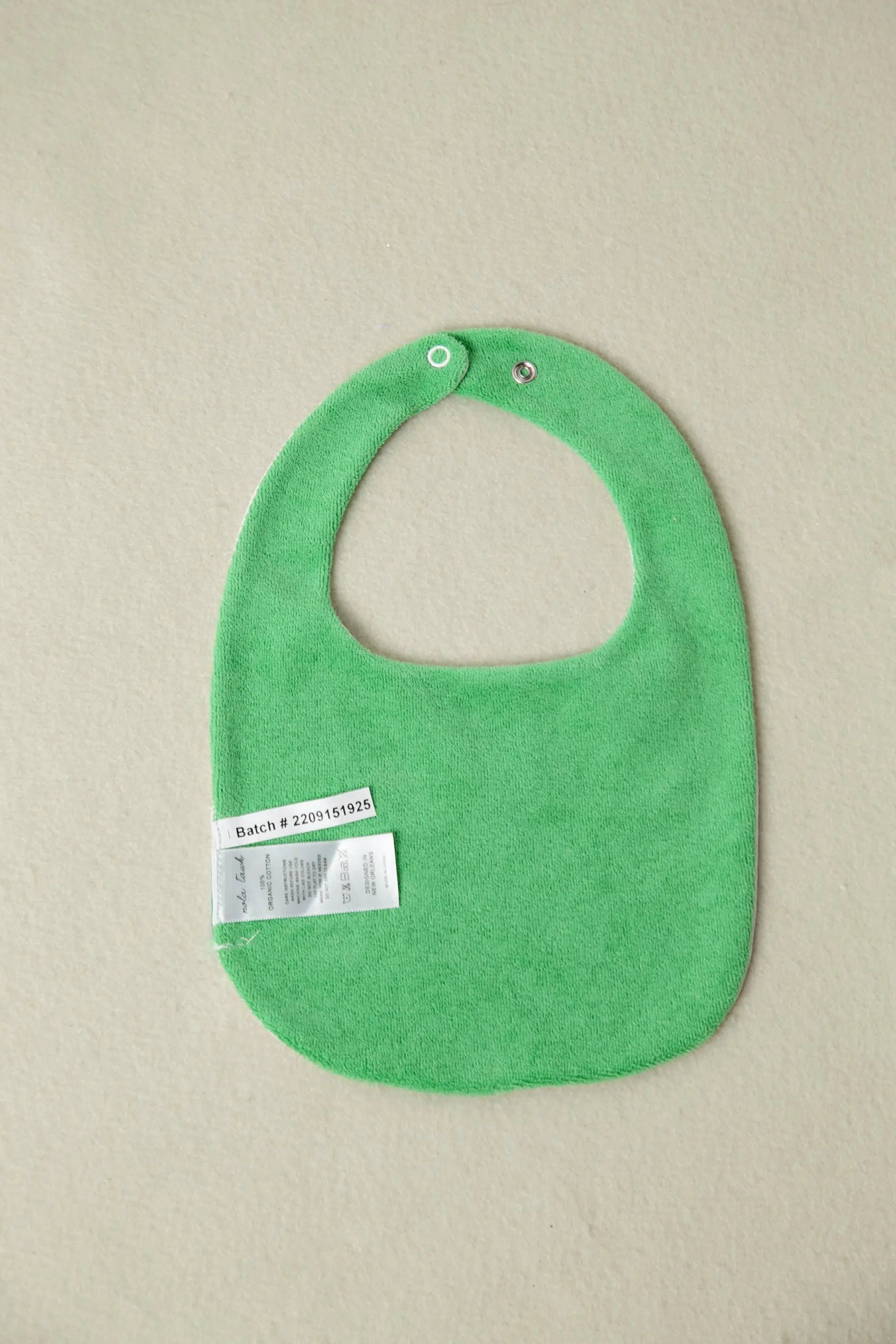 My First Beignet Organic Cotton Baby Bib by Nola Tawk, children's boutique clothing detail photo 2