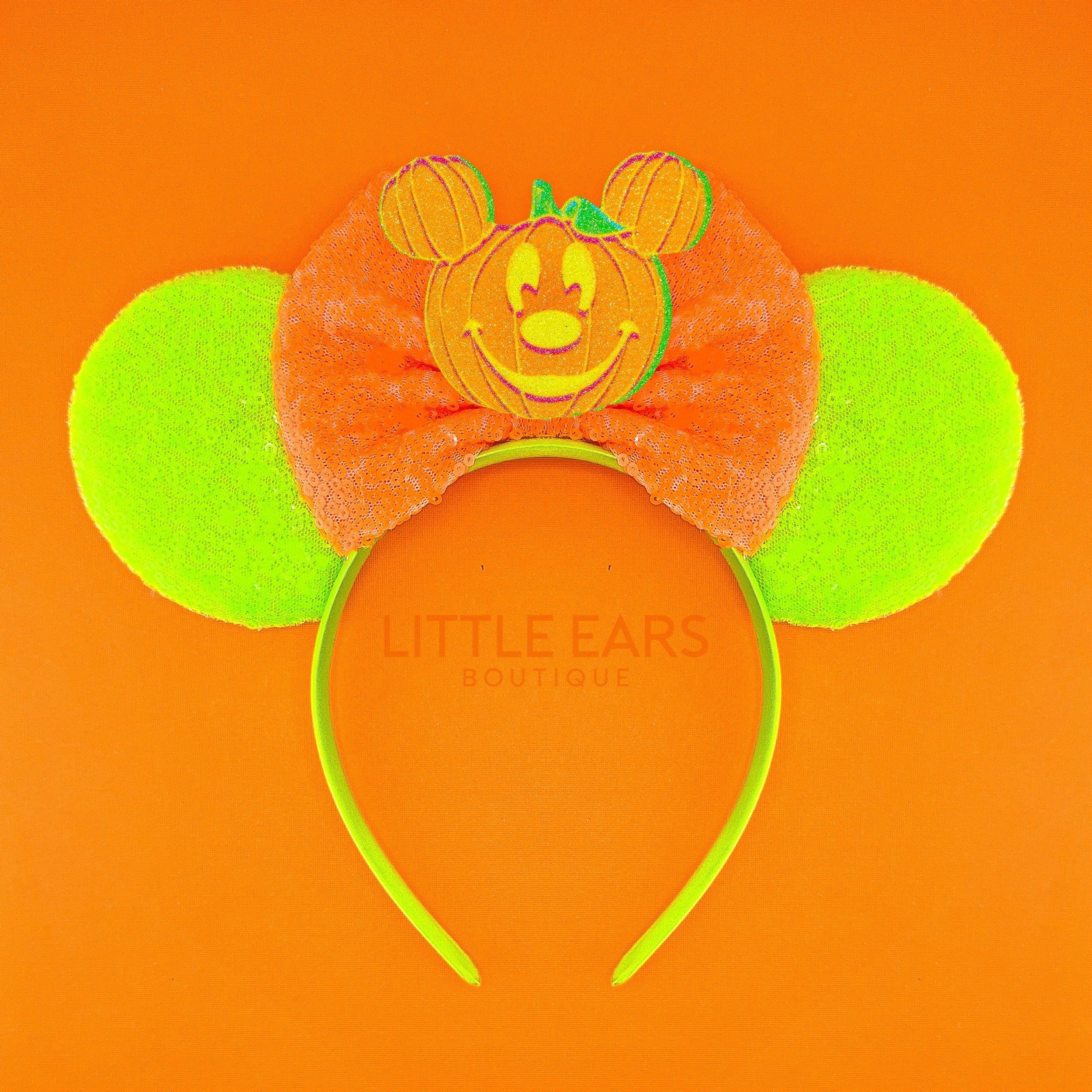 Neon Pumpkin Ears by Little Ears Boutique, travel planning service main product photo
