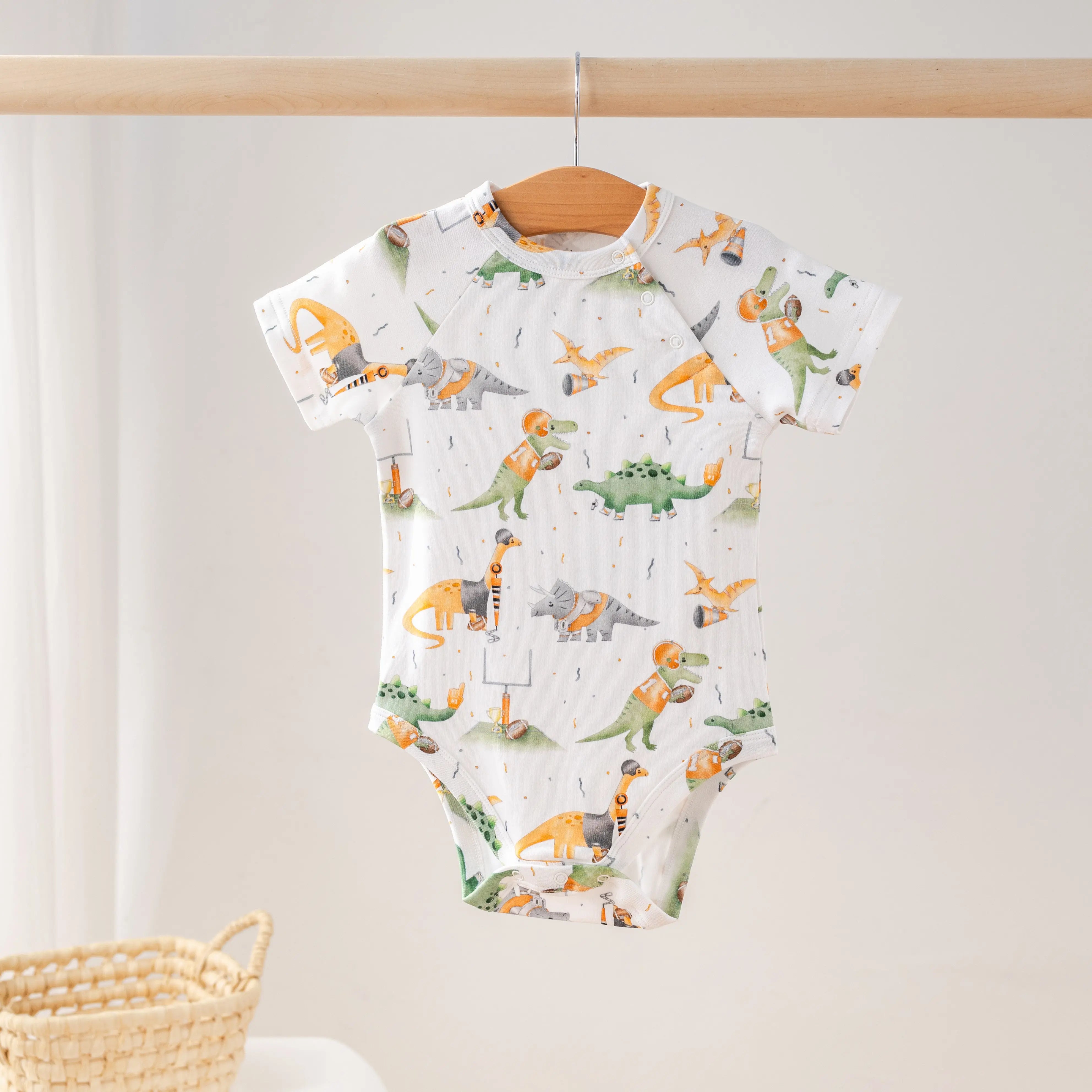 Orange Dino All-Stars Organic Cotton Onesie Nola Tawk