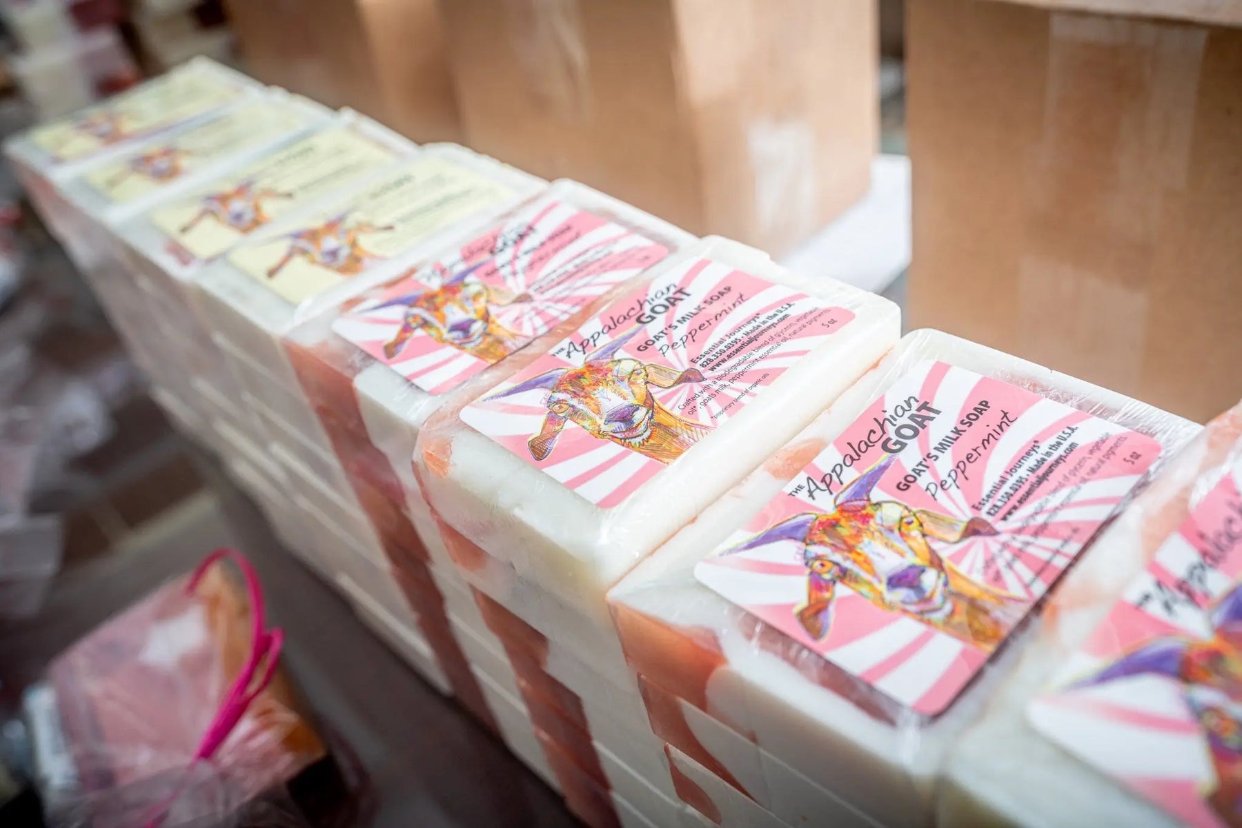 Stack of Appalachian Goat peppermint goat's milk soap bars, 5 oz each.