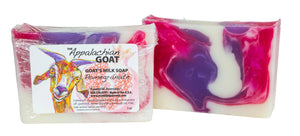 The Appalachian Goat Pomegranate Goat Milk Soap bar with marbled pink, purple, and white colors.