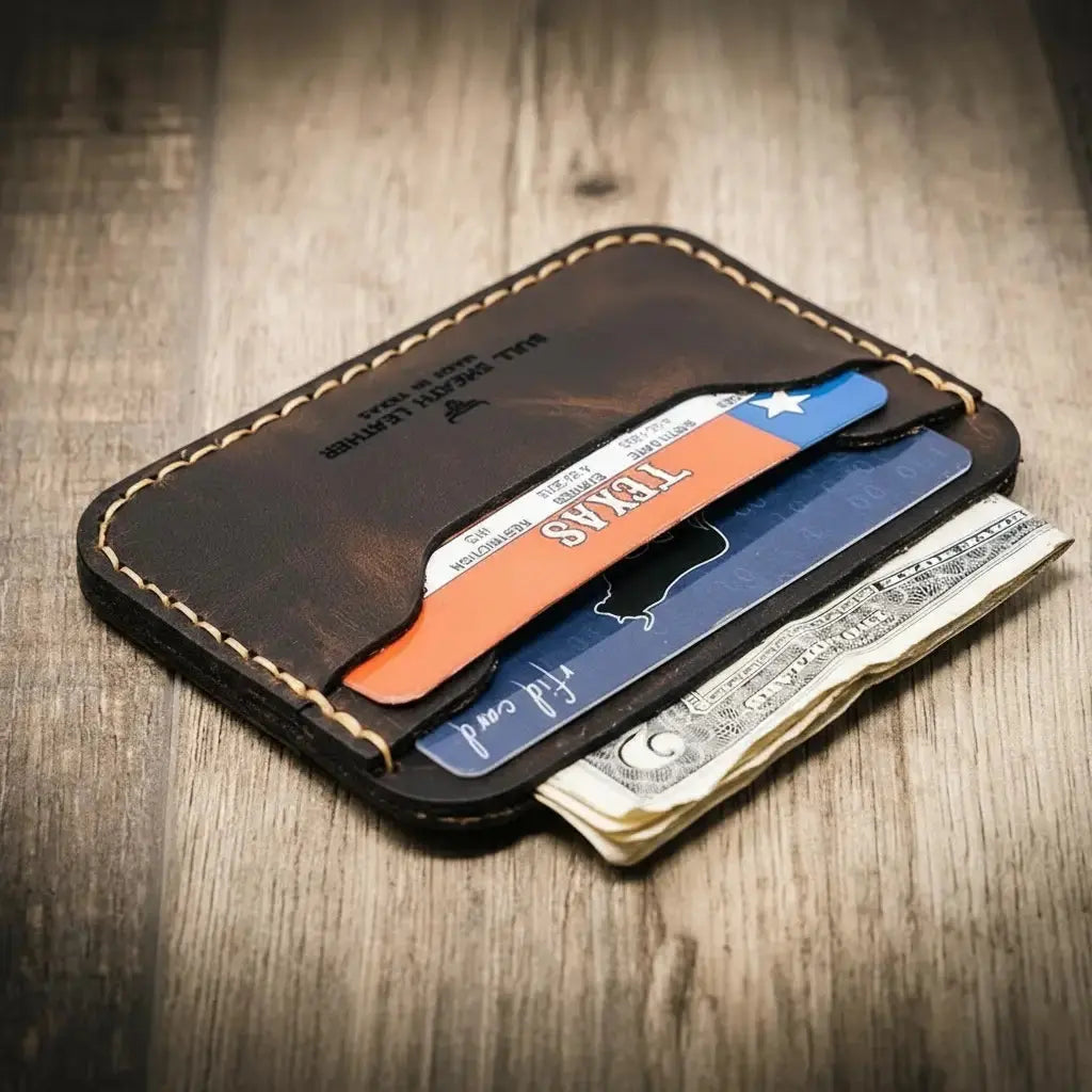Dark brown leather card wallet with Texas ID and cash.