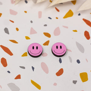Additional view of Happy Face Stud Earrings, 3 Colors Available hand painted on lightweight wood by LE CHIC MIAMI