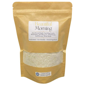 Pouch of ResilScents Beautiful Morning laundry detergent. HE detergent visible.